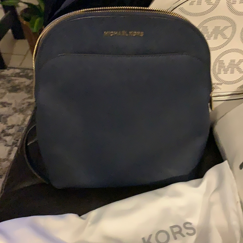 Authentic Michael Kors used blue backpack